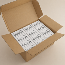 Box of 'Raw Soap' bars on a beige background